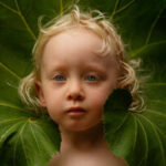Close up photo of girl and leaves