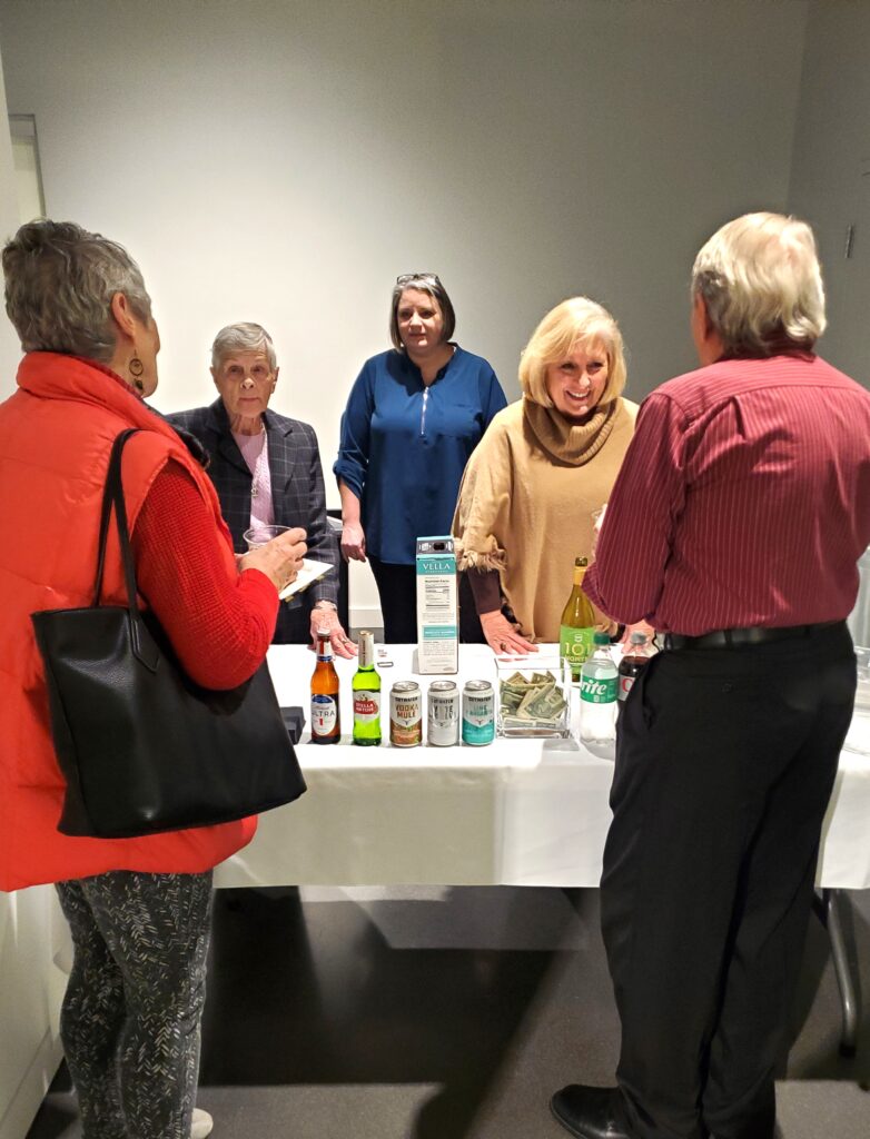 Guests and volunteers chatting